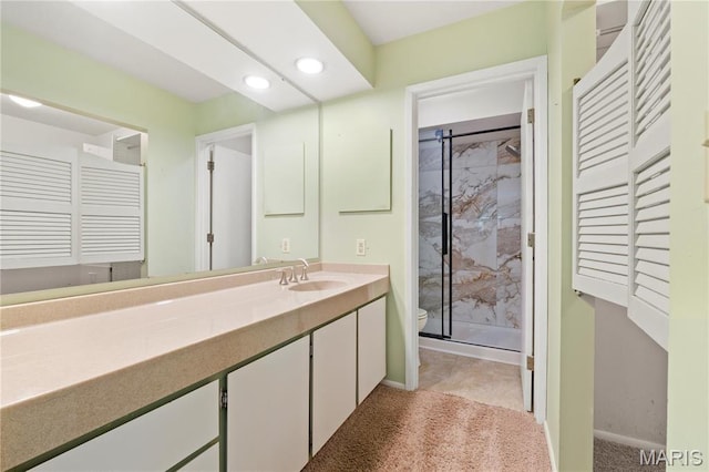 1626 Viola Dr, Imperial, MO 63052 - full bathroom with toilet, a stall shower, vanity, recessed lighting, and baseboards