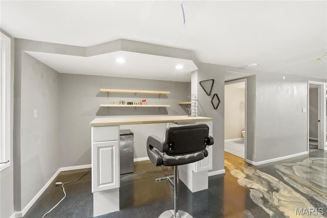 1626 Viola Dr, Imperial, MO 63052 - indoor bar with baseboards, recessed lighting, and finished concrete floors