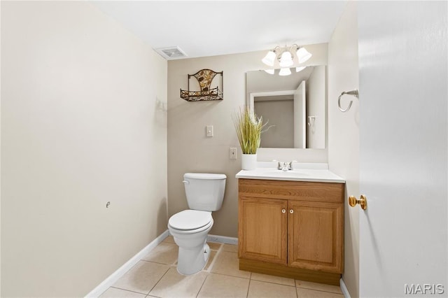 1626 Viola Dr, Imperial, MO 63052 - bathroom featuring tile patterned floors, toilet, vanity, and a chandelier