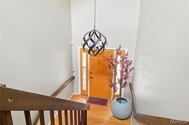 1626 Viola Dr, Imperial, MO 63052 - foyer featuring a chandelier, light wood finished floors, and stairway