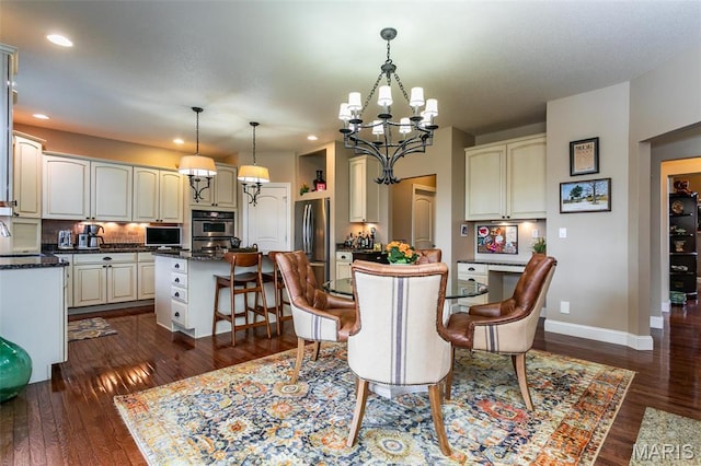 100 Waterfall Ct, Glen Carbon, IL 62034 - dining space with a chandelier, dark wood-style flooring, baseboards, and recessed lighting