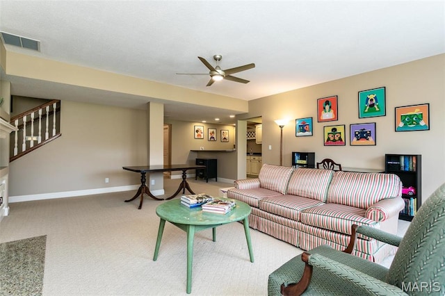 100 Waterfall Ct, Glen Carbon, IL 62034 - carpeted living area featuring ceiling fan, baseboards, and stairs