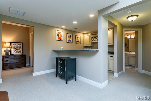 100 Waterfall Ct, Glen Carbon, IL 62034 - bar featuring light carpet, baseboards, recessed lighting, and a sink
