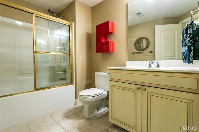 100 Waterfall Ct, Glen Carbon, IL 62034 - full bath featuring tile patterned floors, toilet, vanity, and bath / shower combo with glass door