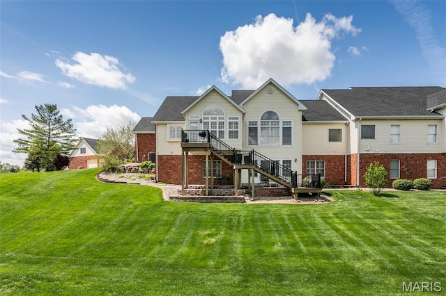 100 Waterfall Ct, Glen Carbon, IL 62034 - back of house with stairway, brick siding, and a yard