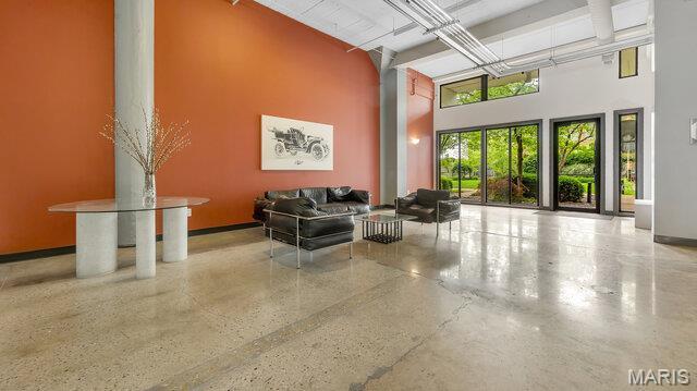 4100 Laclede Ave Unit 314, Saint Louis, MO 63108 - common area with a towering ceiling and beam ceiling