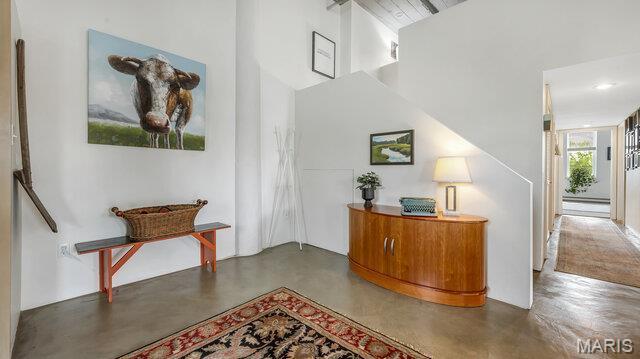 4100 Laclede Ave Unit 314, Saint Louis, MO 63108 - entryway with concrete floors and high vaulted ceiling