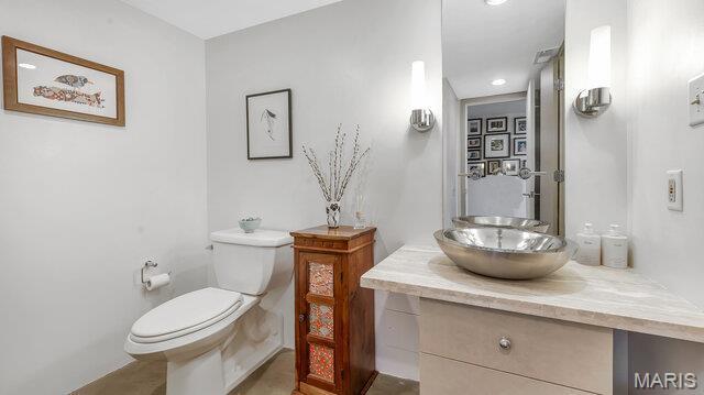 4100 Laclede Ave Unit 314, Saint Louis, MO 63108 - half bath with toilet, vanity, and recessed lighting