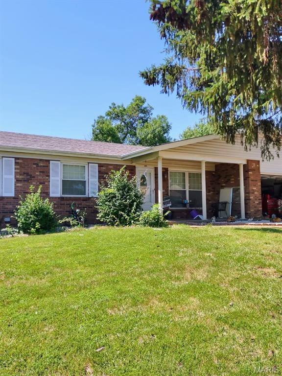 4044 Avery Ln, Bridgeton, MO 63044 - ranch-style house featuring a front lawn and brick siding