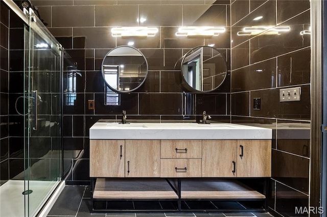 4402 Arco Ave, Saint Louis, MO 63110 - bathroom with double vanity, tile walls, a shower stall, and tasteful backsplash