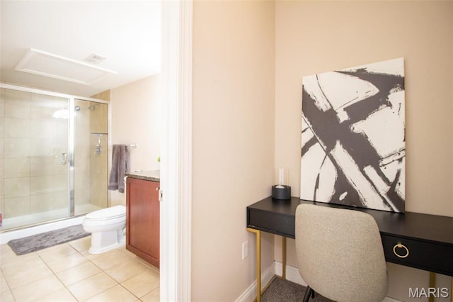 full bath with a stall shower, toilet, tile patterned floors, and vanity