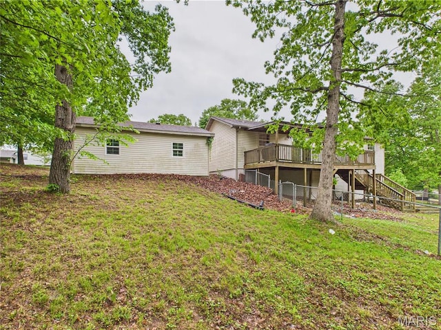 14075 Howard Ln, Dixon, MO 65459 - view of green lawn featuring stairway and a deck