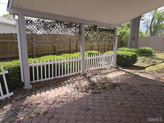 9332 Cloverhurst Dr, Saint Louis, MO 63123 - fenced backyard featuring a patio