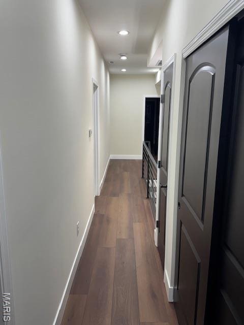4209 Norfolk Ave, Saint Louis, MO 63110 - corridor featuring dark wood finished floors, recessed lighting, and baseboards