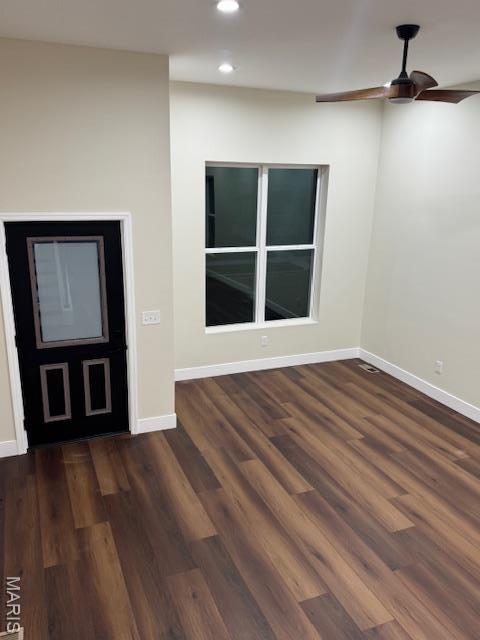 4209 Norfolk Ave, Saint Louis, MO 63110 - spare room with a ceiling fan, baseboards, recessed lighting, and dark wood-style floors