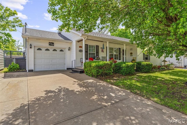 111 Edwards Ln, Park Hills, MO 63601 - ranch-style home featuring a porch, concrete driveway, an attached garage, a front yard, and a shingled roof