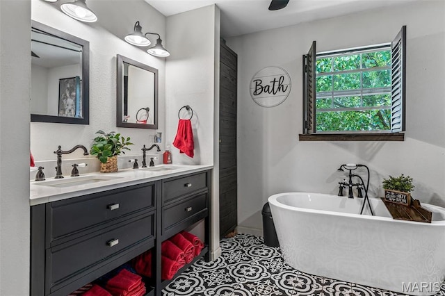 111 Edwards Ln, Park Hills, MO 63601 - full bath with double vanity, a freestanding tub, and tile patterned floors