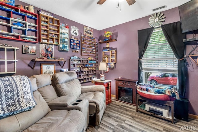 111 Edwards Ln, Park Hills, MO 63601 - living area with wood finished floors, ceiling fan, and baseboards