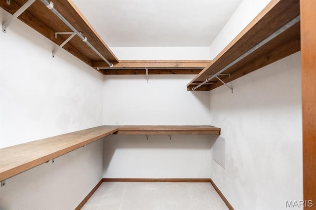 505 Turtle Creek Ct, Ofallon, IL 62269 - walk in closet featuring built in desk