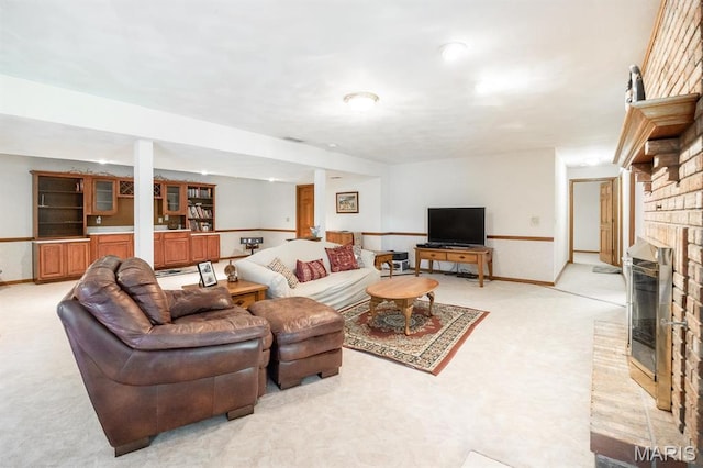 505 Turtle Creek Ct, Ofallon, IL 62269 - living area with light colored carpet, a fireplace, and baseboards