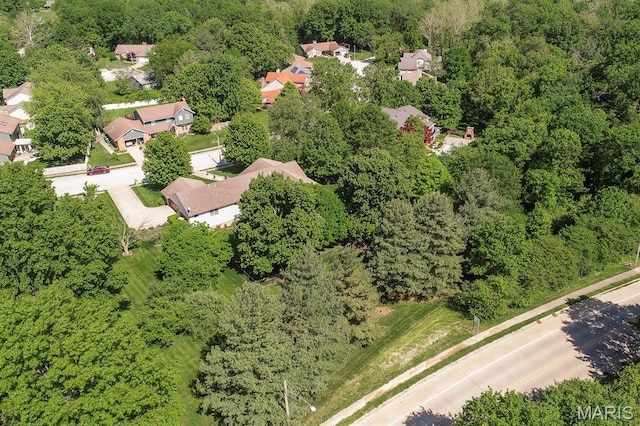 505 Turtle Creek Ct, Ofallon, IL 62269 - aerial overview of property's location with nearby suburban area and a heavily wooded area