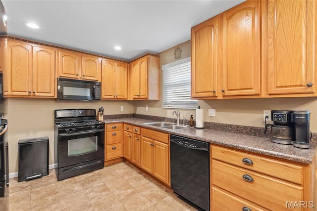 2212 Dawn Pl, Granite City, IL 62040 - kitchen featuring black appliances, a sink, dark countertops, and recessed lighting
