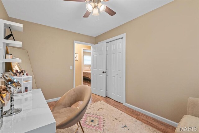 2212 Dawn Pl, Granite City, IL 62040 - office featuring baseboards, light wood-style flooring, and a ceiling fan