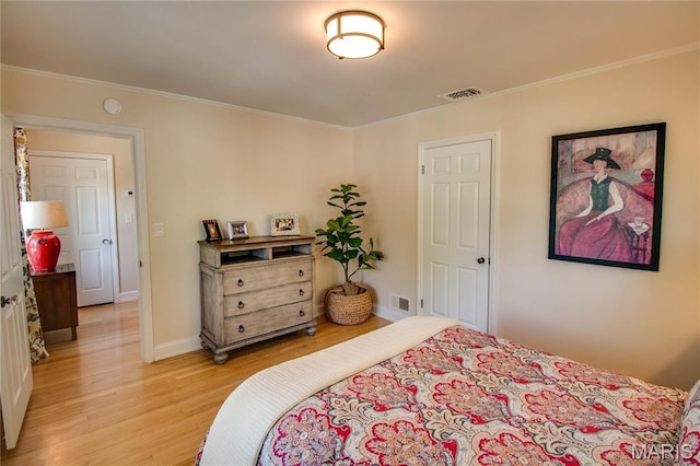 1210 Mckinley Blvd, Alton, IL 62002 - bedroom featuring light wood finished floors, ornamental molding, and baseboards
