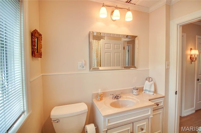 1210 Mckinley Blvd, Alton, IL 62002 - half bathroom featuring plenty of natural light, crown molding, toilet, and vanity