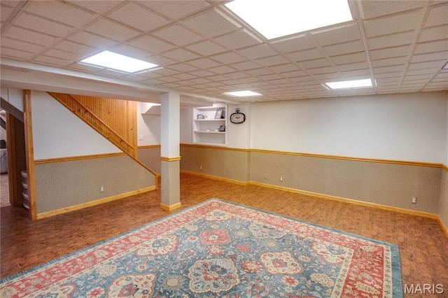 1210 Mckinley Blvd, Alton, IL 62002 - finished below grade area with baseboards, stairway, and a drop ceiling