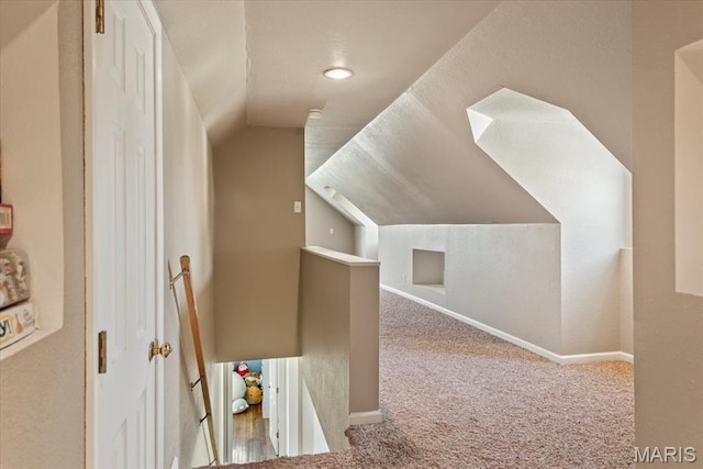 714 W Elm St, Taylorville, IL 62568 - bonus room featuring carpet floors, lofted ceiling, and baseboards