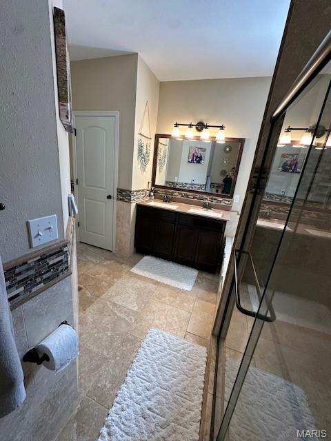 203 Chadwyck Cir, Herculaneum, MO 63048 - bathroom with double vanity and a shower stall