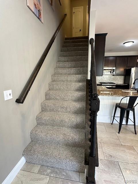 203 Chadwyck Cir, Herculaneum, MO 63048 - staircase with baseboards