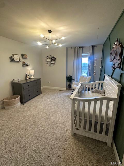 203 Chadwyck Cir, Herculaneum, MO 63048 - bedroom featuring carpet, a chandelier, and baseboards