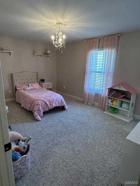 203 Chadwyck Cir, Herculaneum, MO 63048 - carpeted bedroom with a chandelier and baseboards