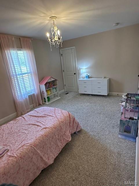 203 Chadwyck Cir, Herculaneum, MO 63048 - carpeted bedroom featuring a chandelier and baseboards