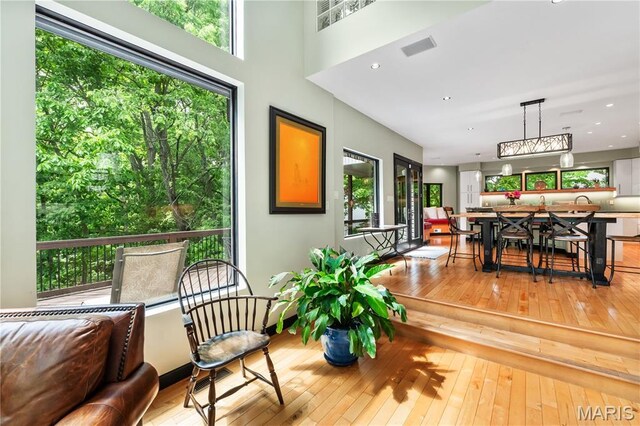 400 Gabriel Dr, Kirkwood, MO 63122 - living area featuring wood-type flooring, healthy amount of natural light, and recessed lighting