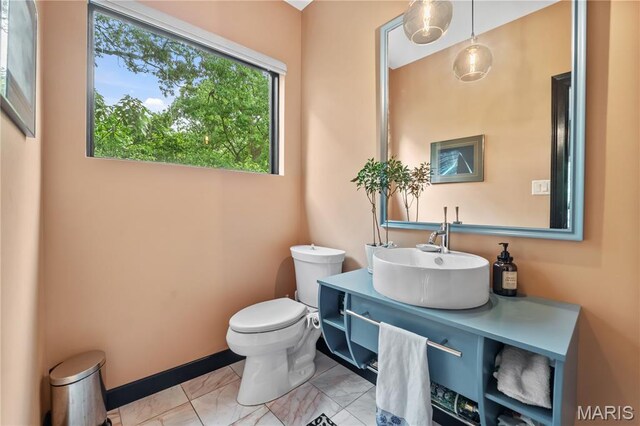 400 Gabriel Dr, Kirkwood, MO 63122 - half bathroom with vanity and marble look tile flooring