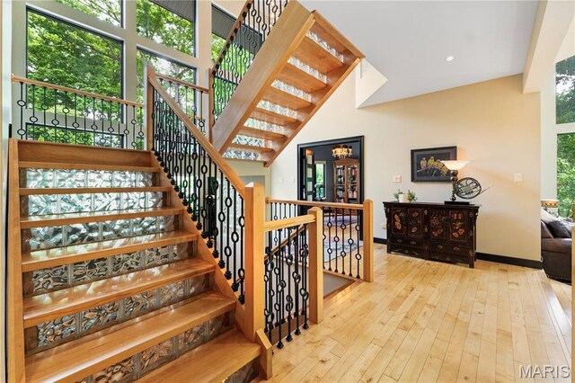 400 Gabriel Dr, Kirkwood, MO 63122 - stairs featuring wood-type flooring and recessed lighting