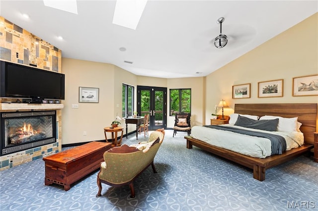 400 Gabriel Dr, Kirkwood, MO 63122 - bedroom featuring carpet, a large fireplace, a skylight, and access to outside