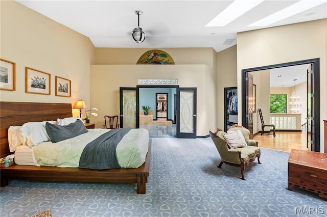 400 Gabriel Dr, Kirkwood, MO 63122 - bedroom with a chandelier and a skylight