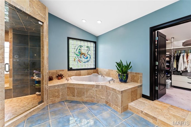 400 Gabriel Dr, Kirkwood, MO 63122 - bathroom with a garden tub, vaulted ceiling, a stall shower, a spacious closet, and recessed lighting