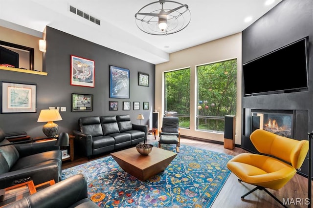 400 Gabriel Dr, Kirkwood, MO 63122 - living room with wood finished floors, a fireplace, and recessed lighting