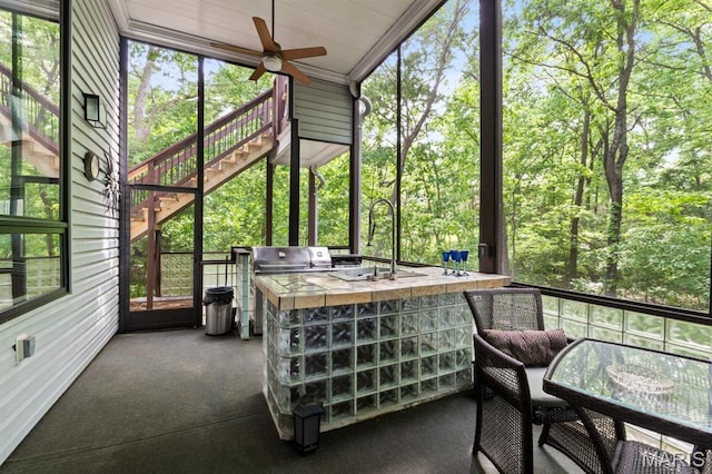 400 Gabriel Dr, Kirkwood, MO 63122 - sunroom / solarium with an outdoor kitchen, a ceiling fan, and plenty of natural light