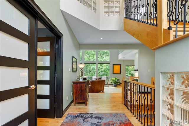 400 Gabriel Dr, Kirkwood, MO 63122 - foyer with a towering ceiling, wood finished floors, plenty of natural light, and recessed lighting