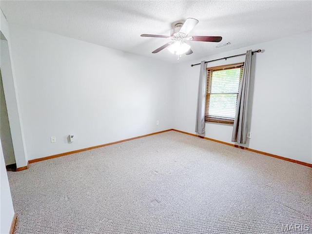6 Fig St Unit 11, Sullivan, MO 63080 - unfurnished room featuring ceiling fan, carpet flooring, and a textured ceiling