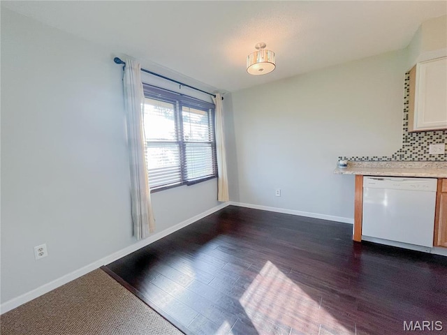 6 Fig St Unit 11, Sullivan, MO 63080 - unfurnished dining area featuring dark wood-style floors and baseboards