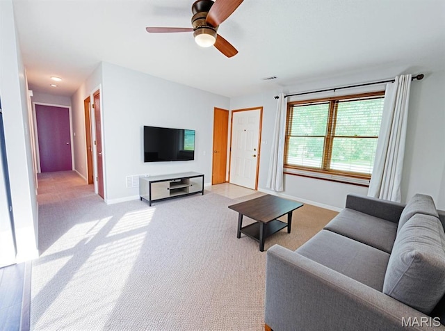 6 Fig St Unit 11, Sullivan, MO 63080 - living area featuring light colored carpet and a ceiling fan