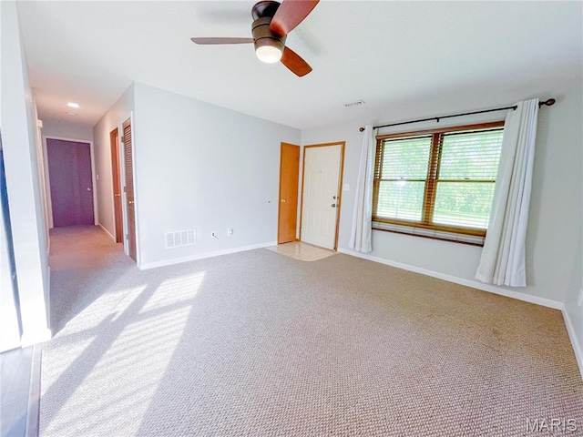 6 Fig St Unit 11, Sullivan, MO 63080 - empty room with carpet flooring and a ceiling fan