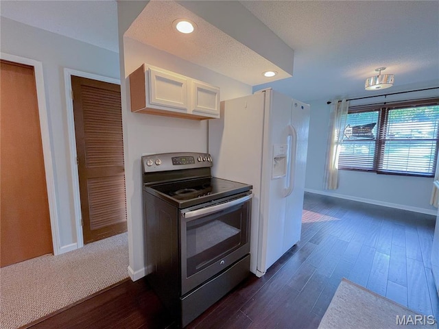 6 Fig St Unit 11, Sullivan, MO 63080 - kitchen with stainless steel electric range oven, dark wood-style flooring, white cabinets, white fridge with ice dispenser, and recessed lighting